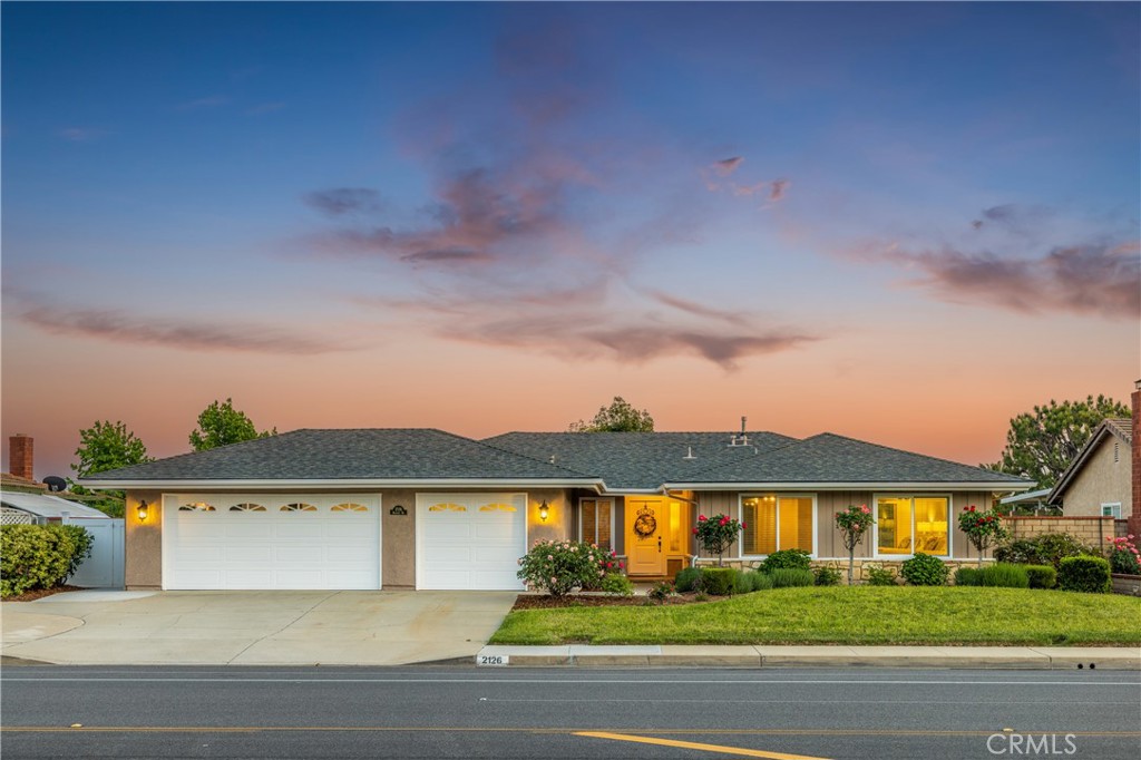 2126 Baseline Road La Verne, CA 91750 - Photo 39 of 39 a front view of a house with a garden and yard
