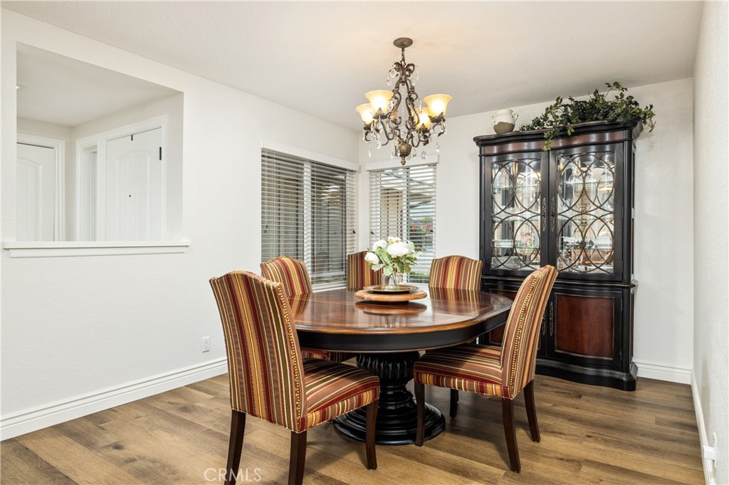 2126 Baseline Road La Verne, CA 91750 - Photo 10 of 39 a view of a dining room with furniture window and wooden floor