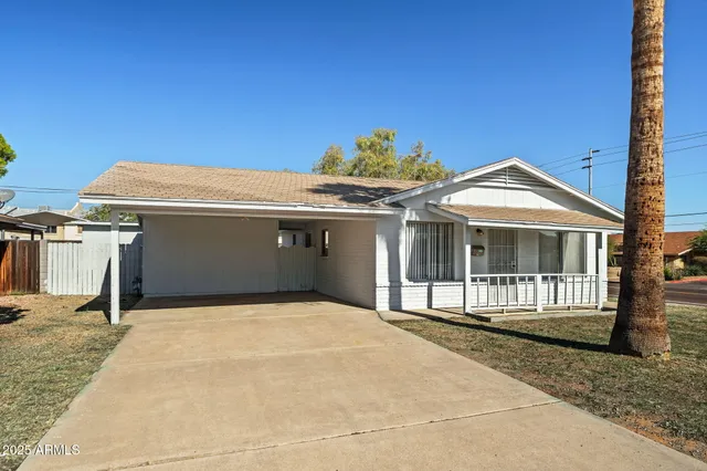 a front view of a house with a garage
