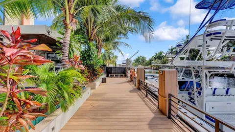 a view of entryway dining room and hall with wooden floor
