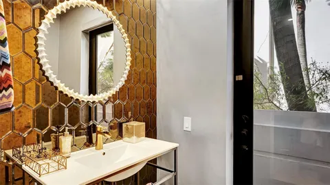 a bed room with a bed and a window