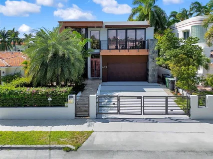 a brick building with a small yard