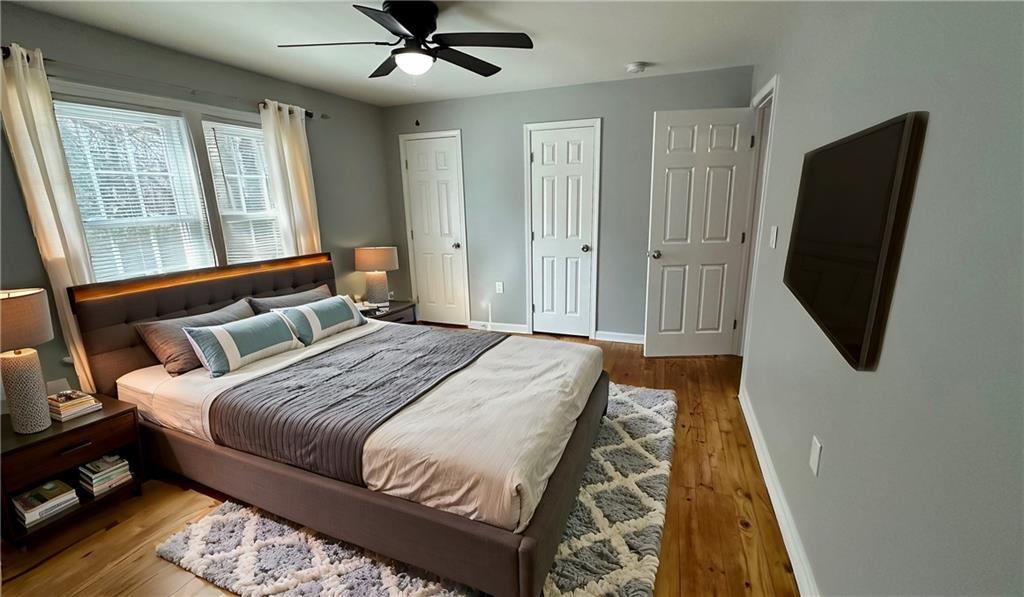 1770 Springview Road Northwest Atlanta, GA 30314 - Photo 21 of 30 a bedroom with a large bed and a window