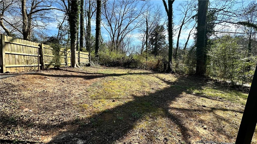 1770 Springview Road Northwest Atlanta, GA 30314 - Photo 29 of 30 a view of a yard with trees