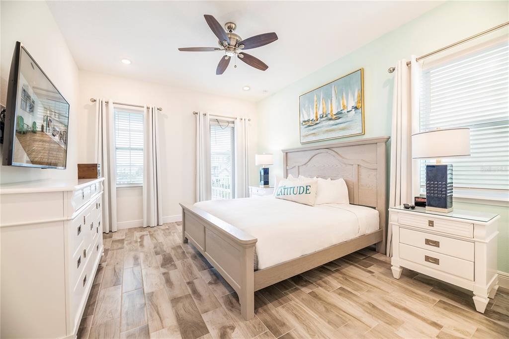 8145 Surf Street Kissimmee, FL 34747 - Photo 12 of 28 a large white bed in a white room