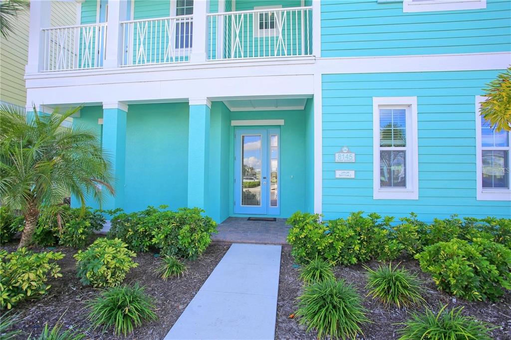 8145 Surf Street Kissimmee, FL 34747 - Photo 3 of 28 a view of a pathway besides a house