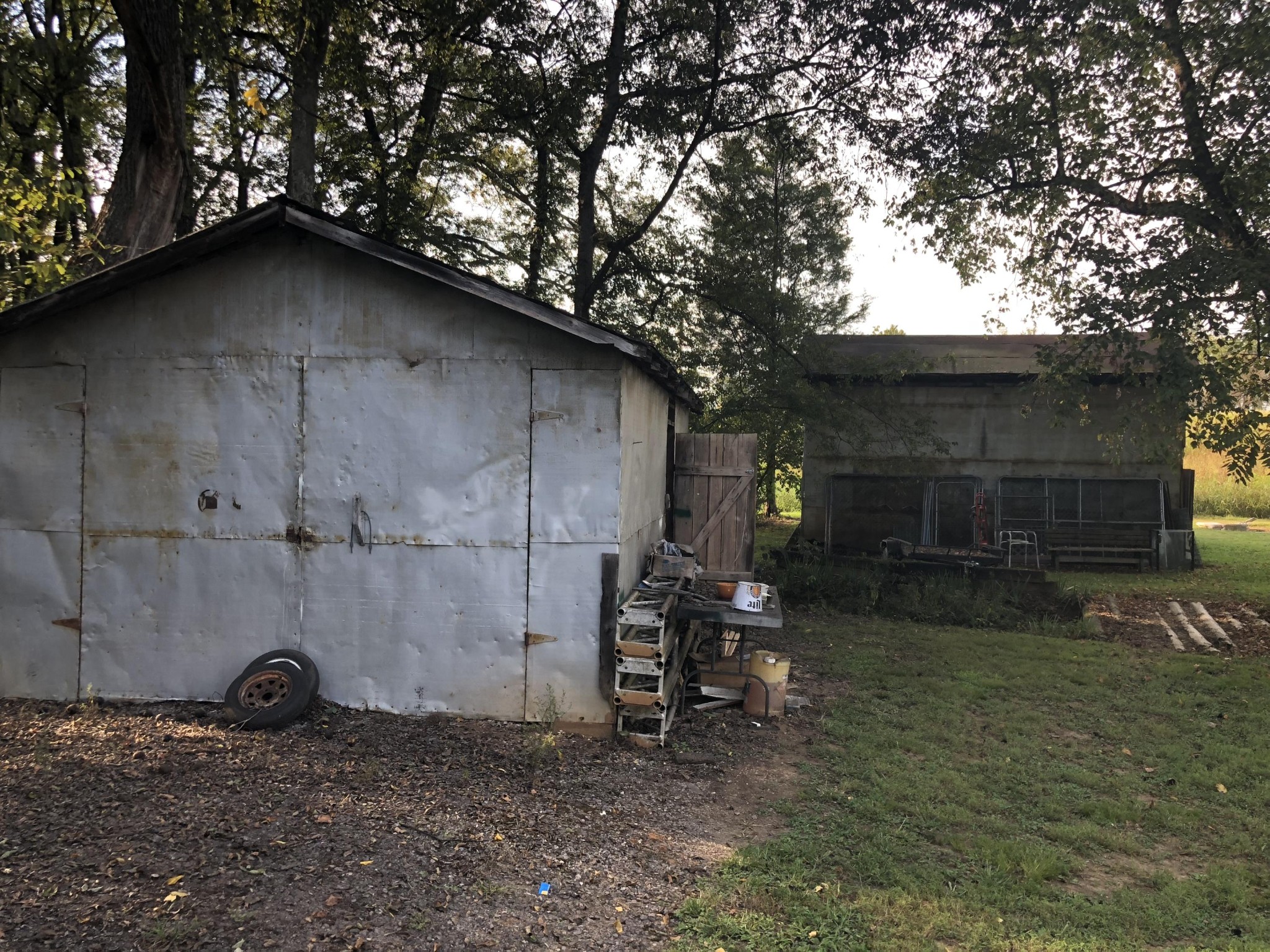 5552 Niles Ferry Road Greenback, TN 37742 - Photo 15 of 30 a backyard of a house with barbeque oven and outdoor seating