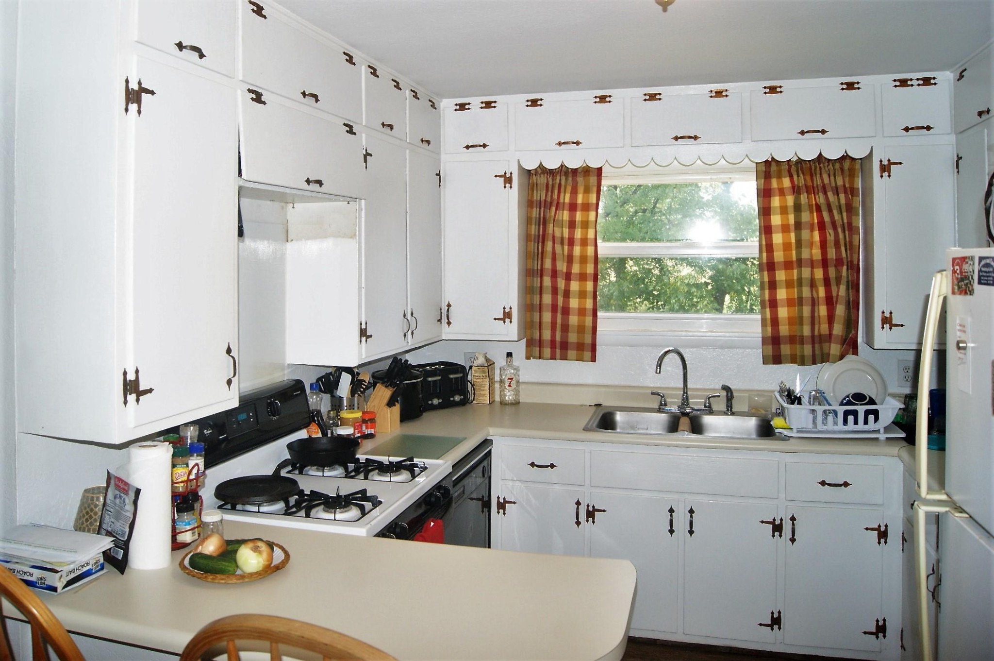 5552 Niles Ferry Road Greenback, TN 37742 - Photo 23 of 30 a kitchen with sink a stove and a window