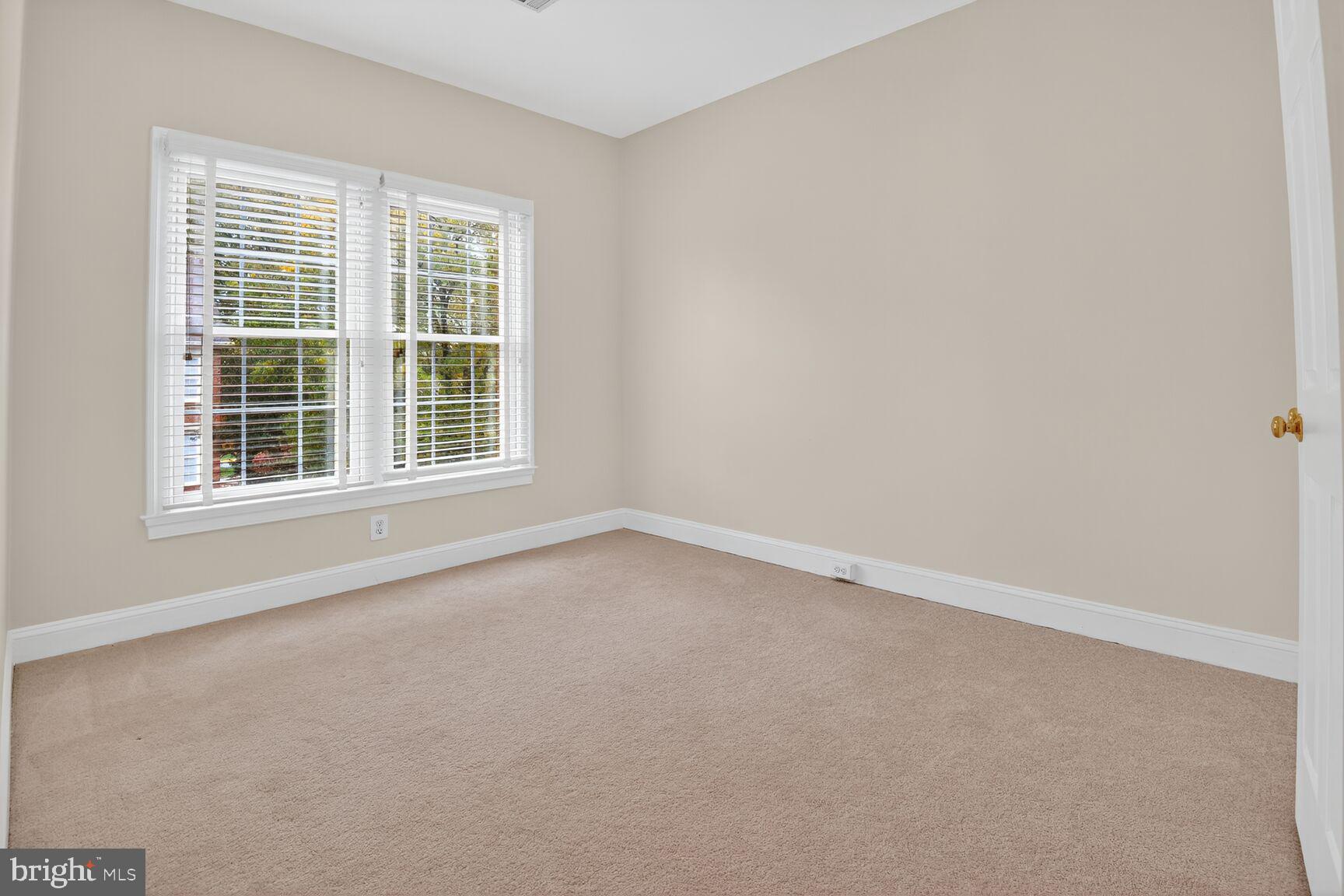11405 Summer House Court Reston, VA 20194 - Photo 9 of 20 an empty room with a window