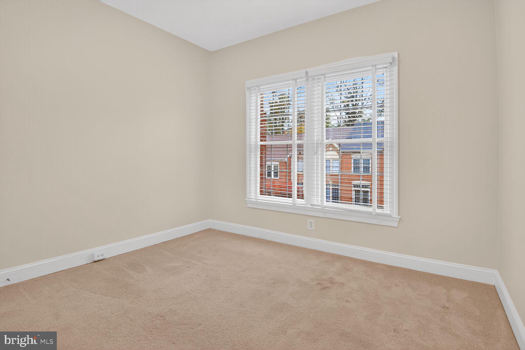 11405 Summer House Court Reston, VA 20194 - Photo 10 of 20 an empty room with a window