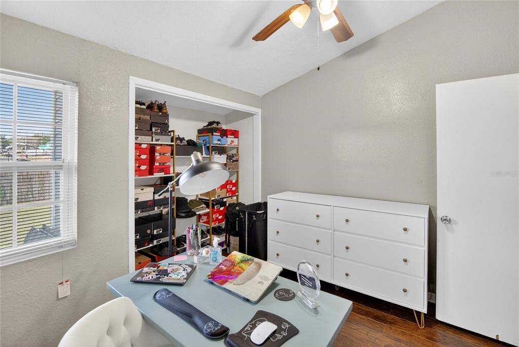 1009 Lenna Avenue Seffner, FL 33584 - Photo 21 of 68 a view of a workspace with furniture and toys