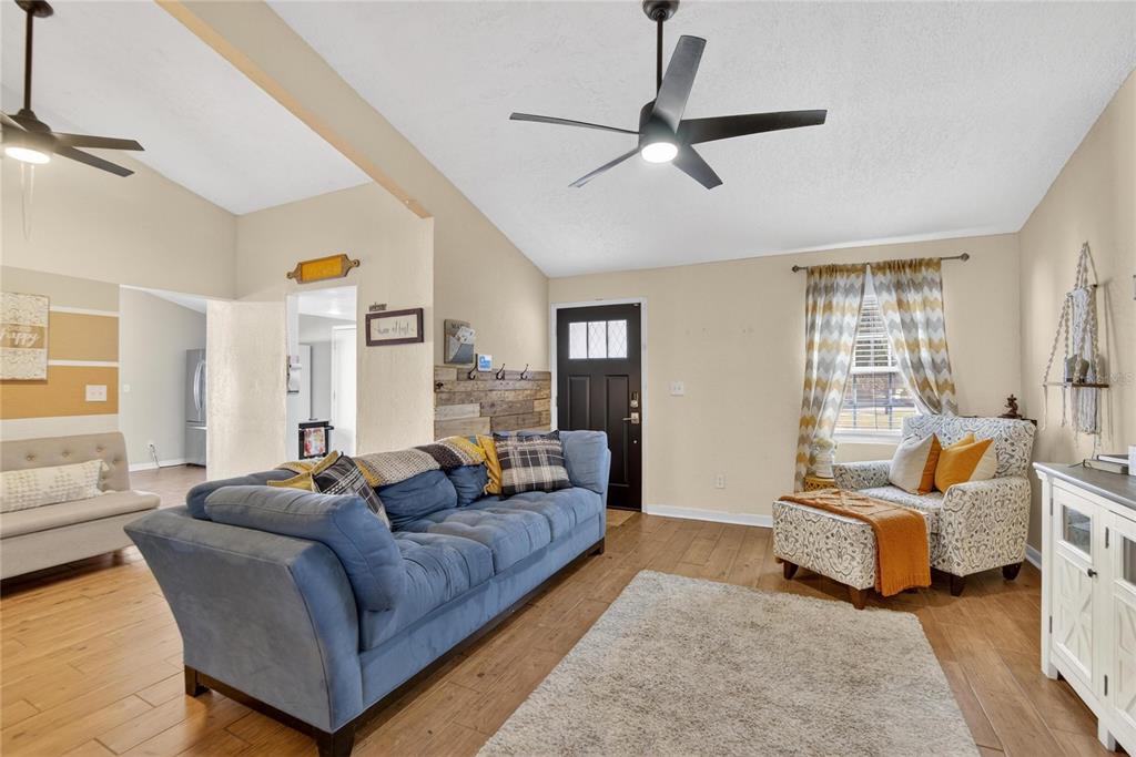 1009 Lenna Avenue Seffner, FL 33584 - Photo 6 of 68 a living room with furniture and a large window