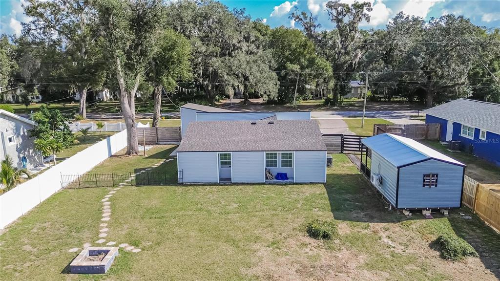 1009 Lenna Avenue Seffner, FL 33584 - Photo 67 of 68 a view of a house with a yard