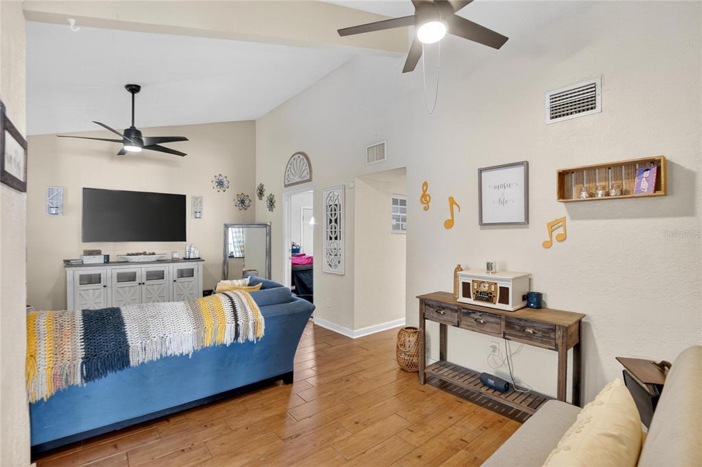 1009 Lenna Avenue Seffner, FL 33584 - Photo 8 of 68 a living room with furniture and a flat screen tv