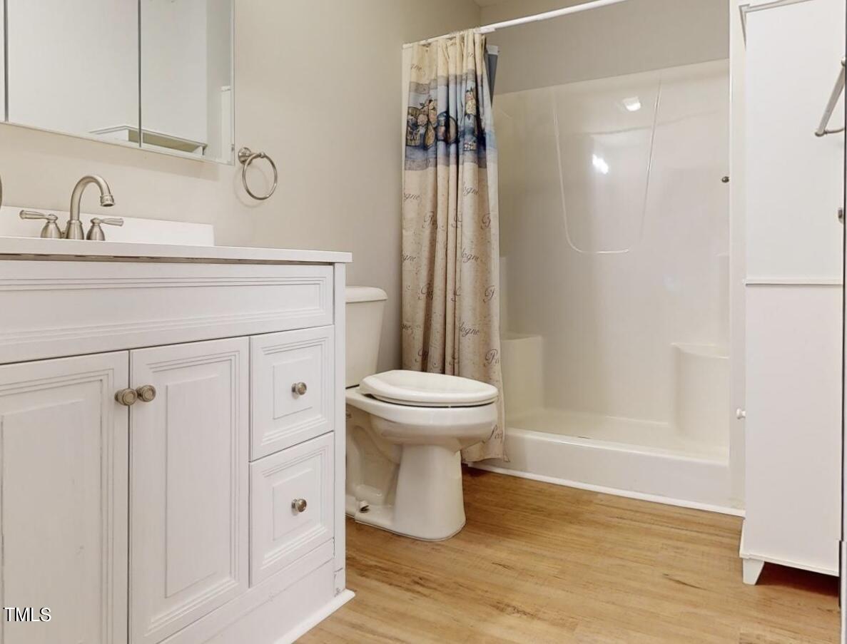 131 Brookfield Circle Sanford, NC 27330 - Photo 20 of 46 a bathroom with a sink toilet and shower
