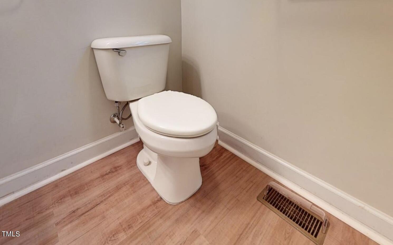 131 Brookfield Circle Sanford, NC 27330 - Photo 29 of 46 a close view of a toilet in bathroom