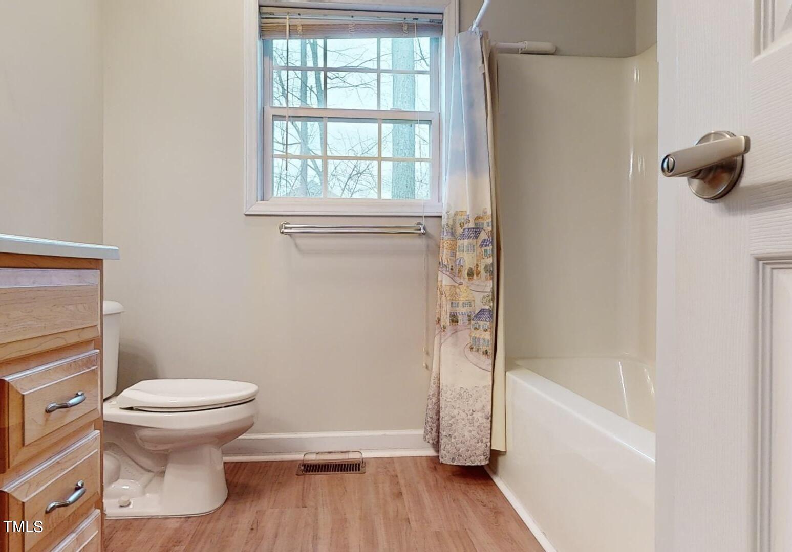 131 Brookfield Circle Sanford, NC 27330 - Photo 30 of 46 a bathroom with a toilet and a shower