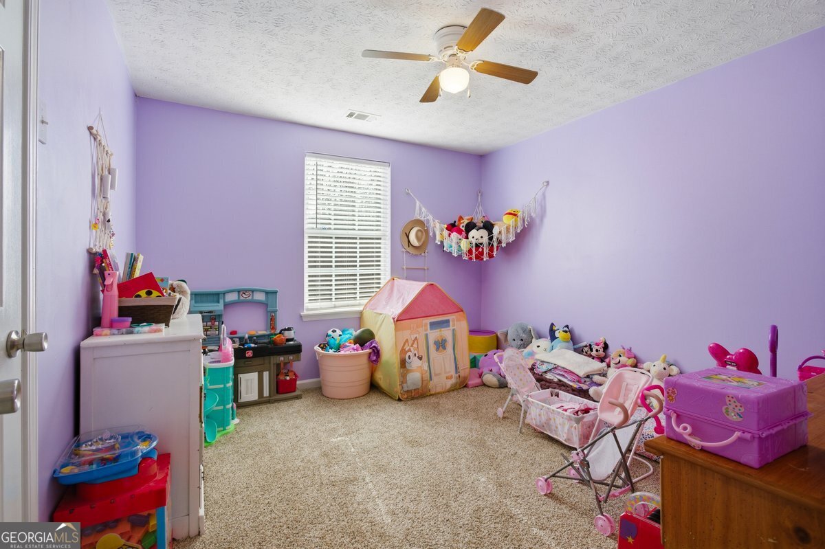 170 Hunters Trace Covington, GA 30014 - Photo 23 of 29 a play room with toys