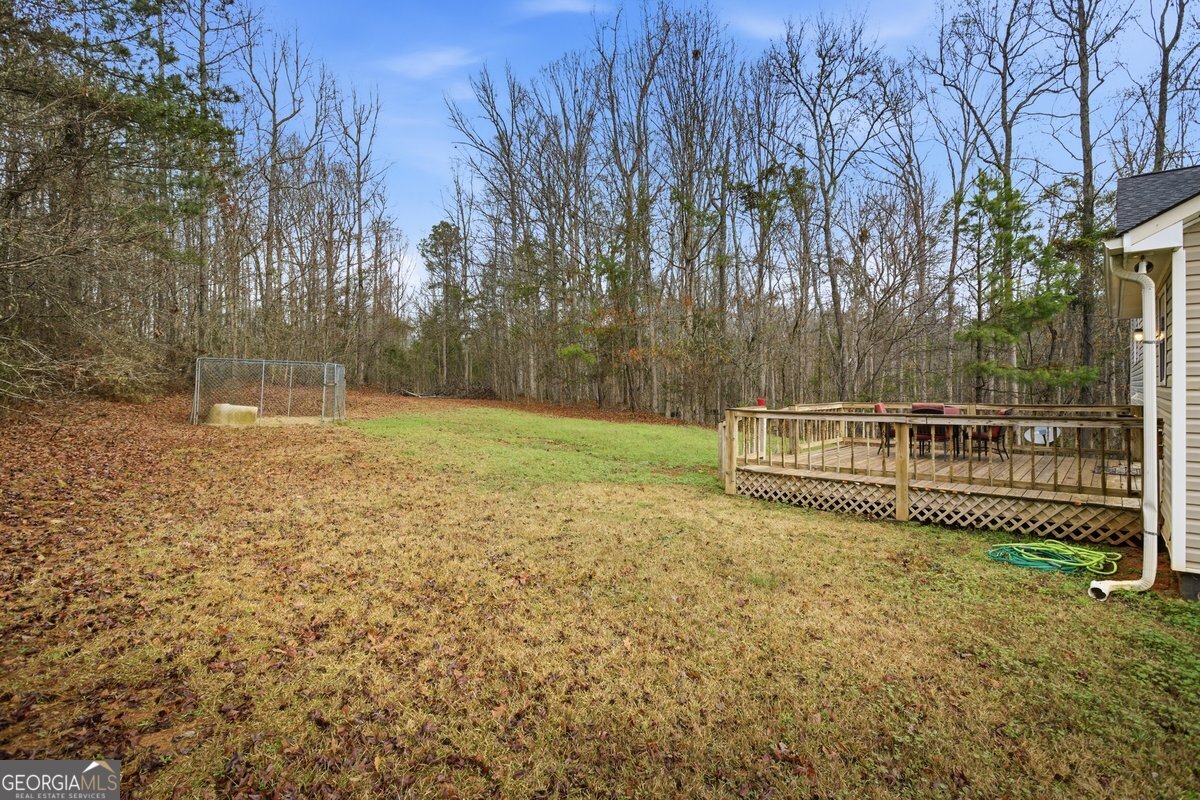 170 Hunters Trace Covington, GA 30014 - Photo 9 of 29 a view of outdoor space with garden