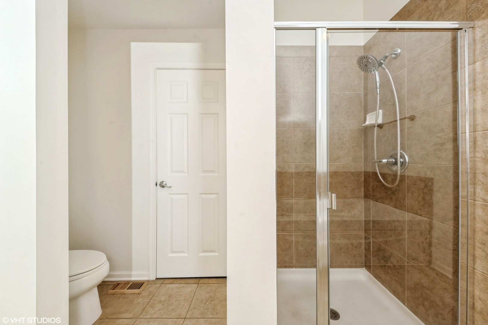 2517 South Calumet Avenue, Unit 31A Chicago, IL 60616 - Photo 13 of 17 a bathroom with a shower and a toilet