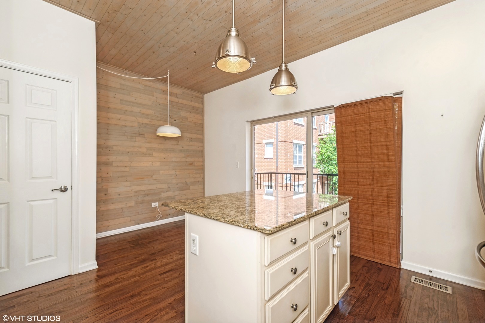 2517 South Calumet Avenue, Unit 31A Chicago, IL 60616 - Photo 7 of 17 a bathroom with a granite countertop sink a mirror and shower