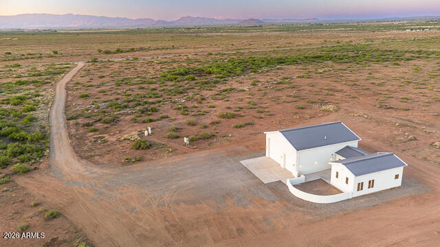 6233 West Airport Road Willcox, AZ 85643 - Photo 7 of 54 a view of a ocean with a mountain
