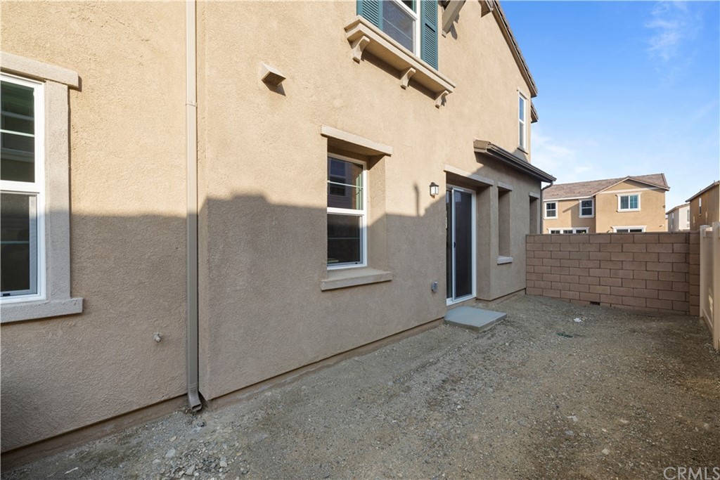 1752 Apricot Tree Place Upland, CA 91784 - Photo 13 of 23 an empty room with windows