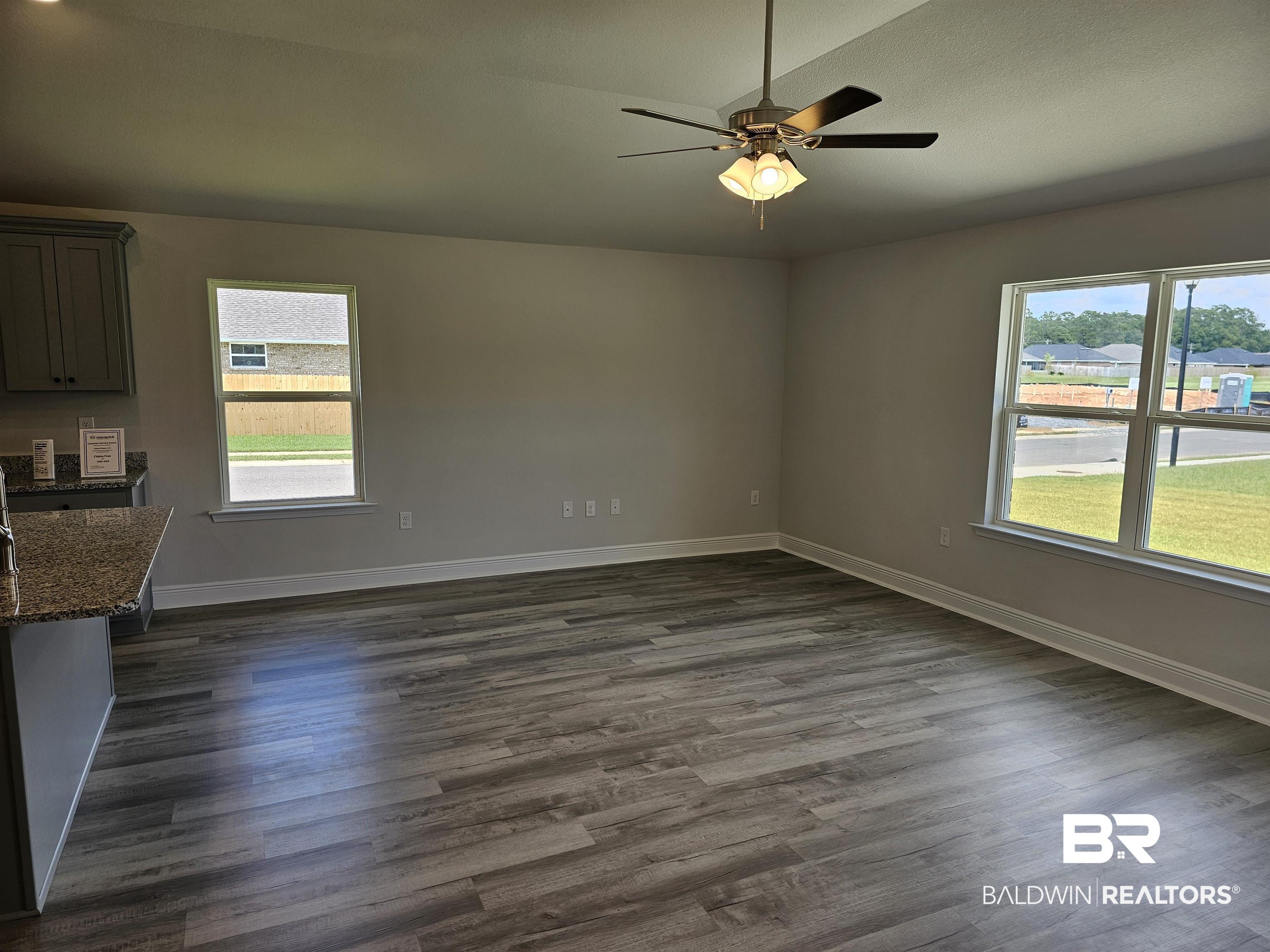 1412 Plymouth Drive Foley, AL 36535 - Photo 8 of 10 Interior space with ceiling fan and dark hardwood / wood-style floors
