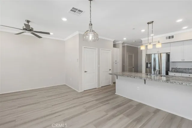 a view of a kitchen and a sink