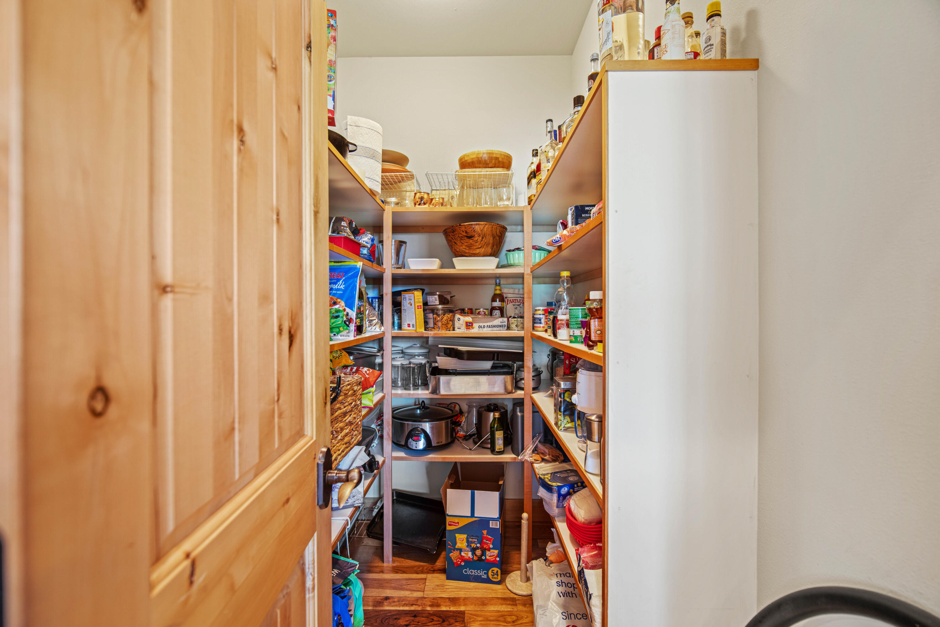 56689 Dancing Rock Loop Bend, OR 97707 - Photo 17 of 51 a view of a hallway with shelves