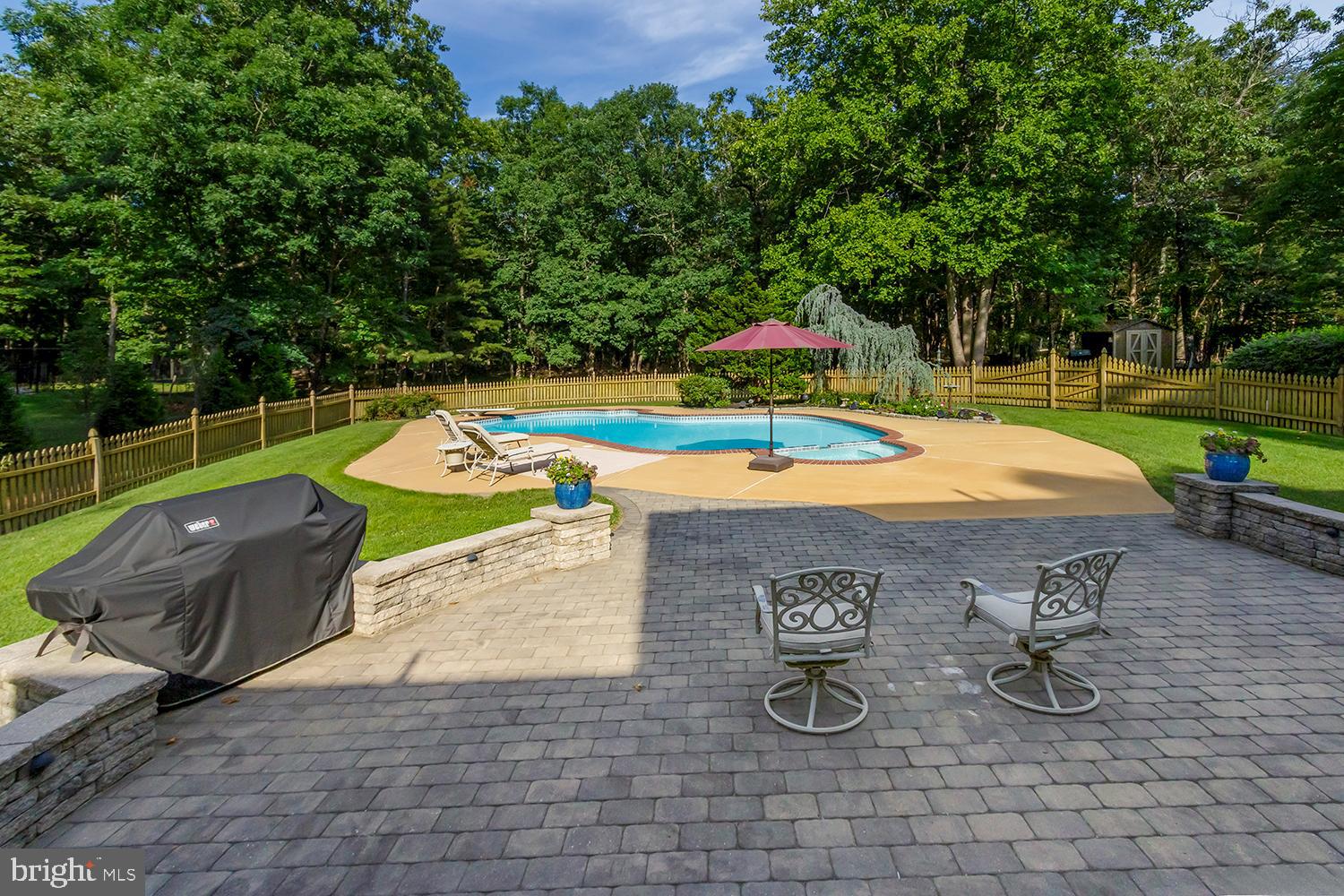 6 Cobblestone Lane Shamong, NJ 08088 - Photo 32 of 36 Paver patio overlooking pool area