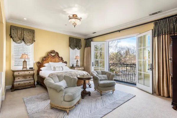 a bath room with a bed and a table