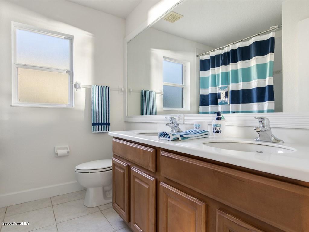 3740 Chardonnay Drive Rockledge, FL 32955 - Photo 21 of 46 Guest Bath W/ double sinks
