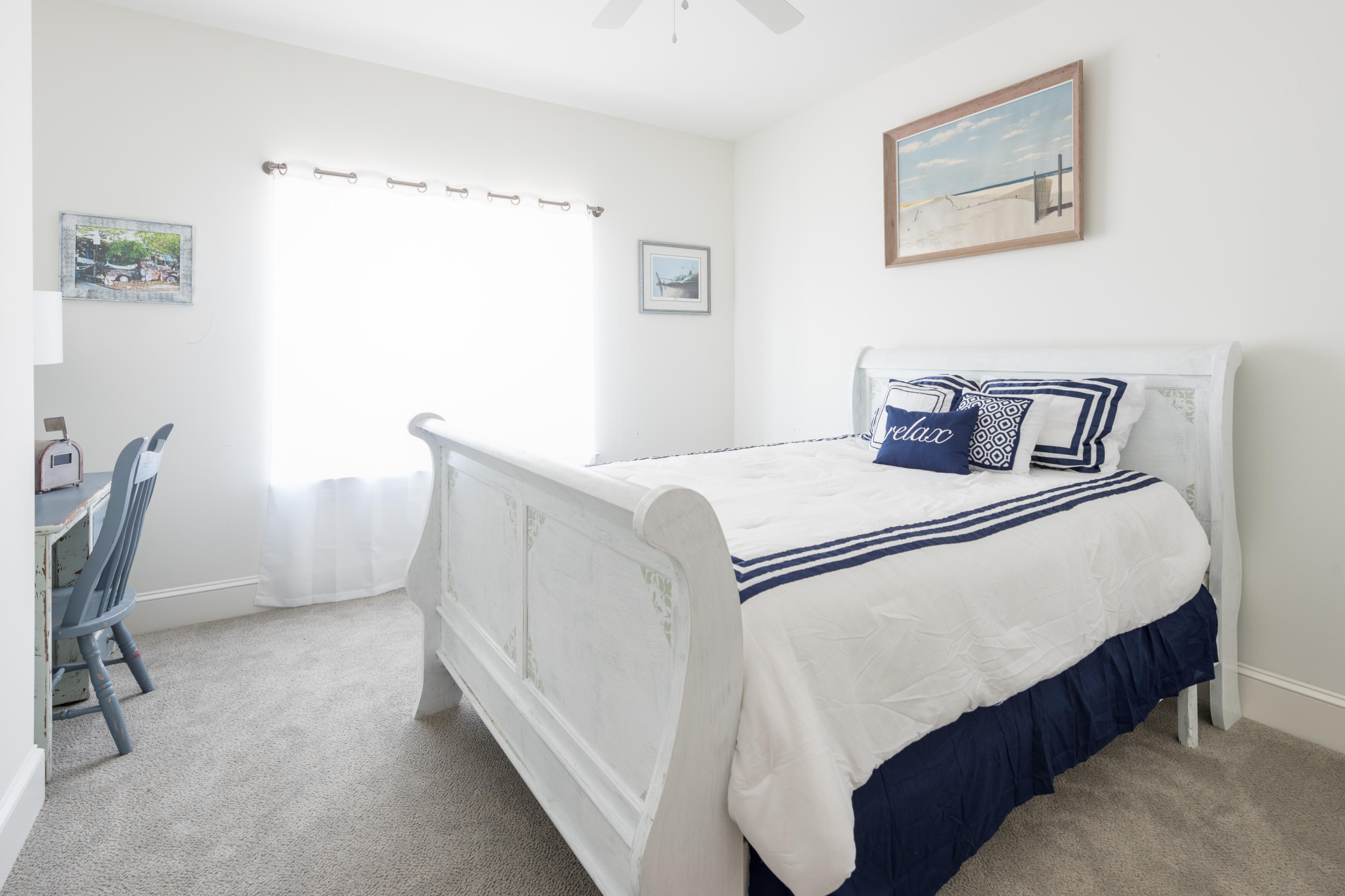 10 Inlet Cove Inlet Beach, FL 32461 - Photo 26 of 47 a bedroom with a bed and a table in it