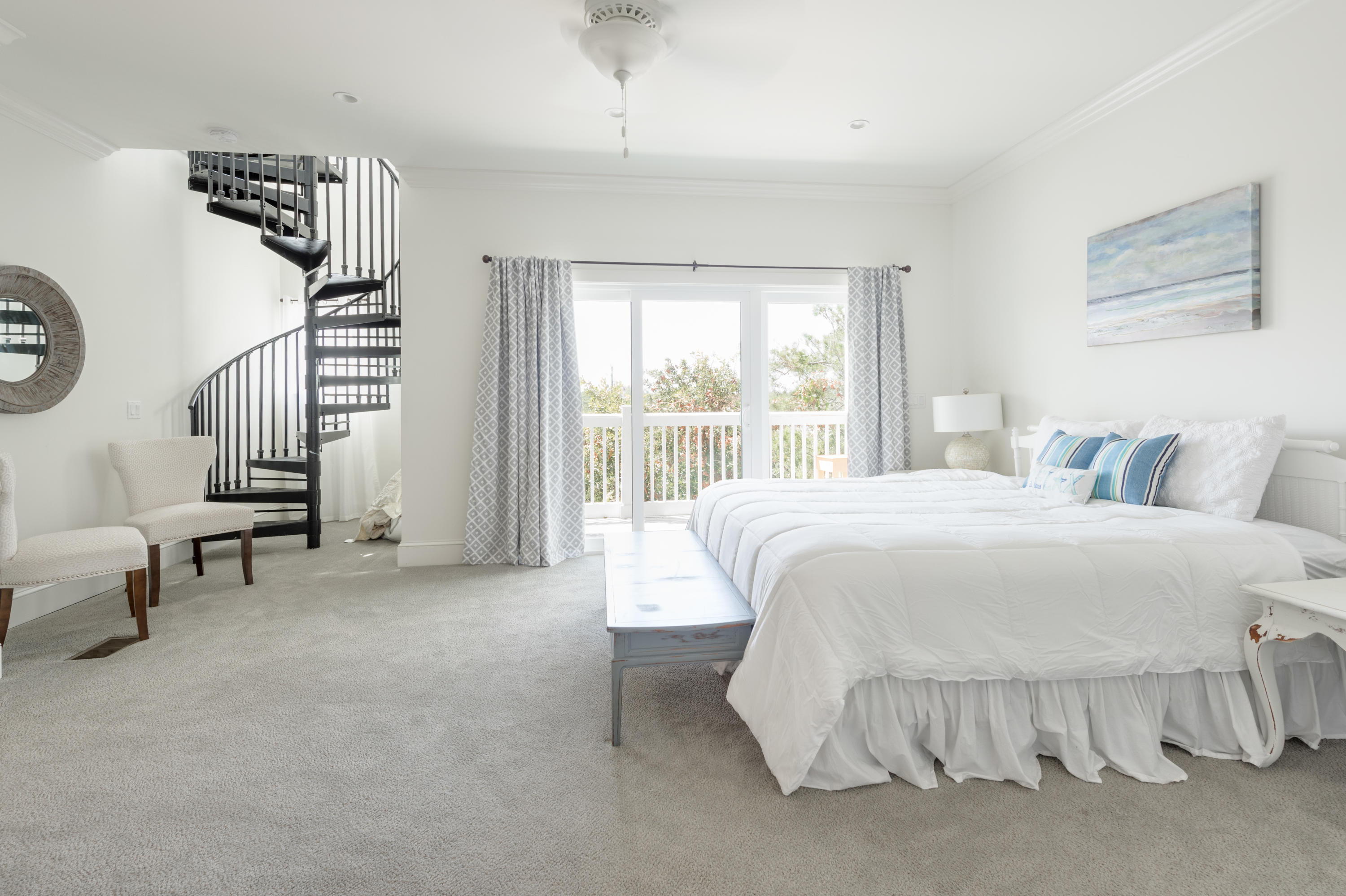 10 Inlet Cove Inlet Beach, FL 32461 - Photo 29 of 47 a spacious bedroom with a bed a couch and a window