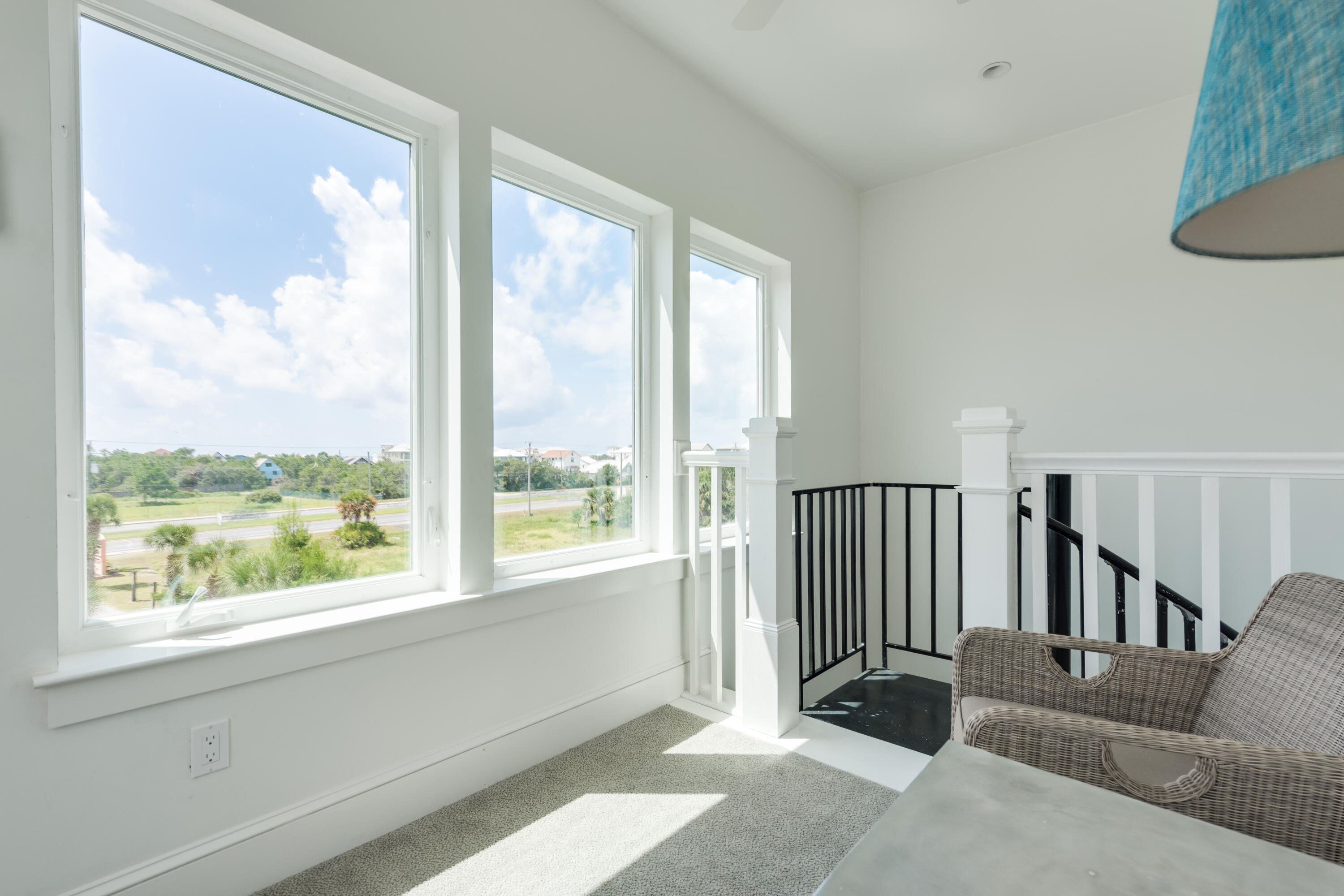 10 Inlet Cove Inlet Beach, FL 32461 - Photo 32 of 47 a living room with furniture and a large window