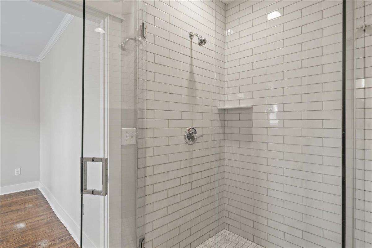 598 Spring Street Memphis, TN 38112 - Photo 16 of 29 a bathroom with a shower