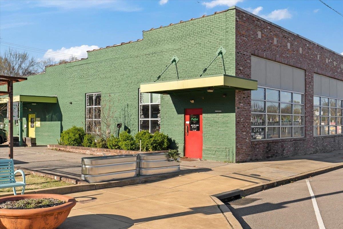 598 Spring Street Memphis, TN 38112 - Photo 28 of 29 a front view of a house with porch