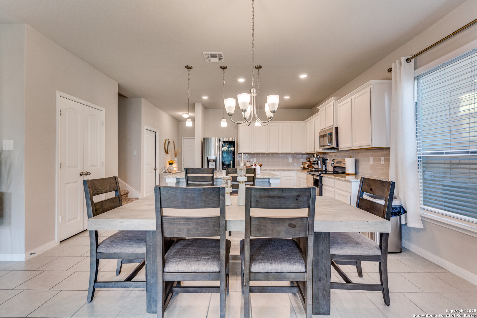 4807 Marylebone Avenue Converse, TX 78109 - Photo 9 of 25 a view of a dining room kitchen and a window