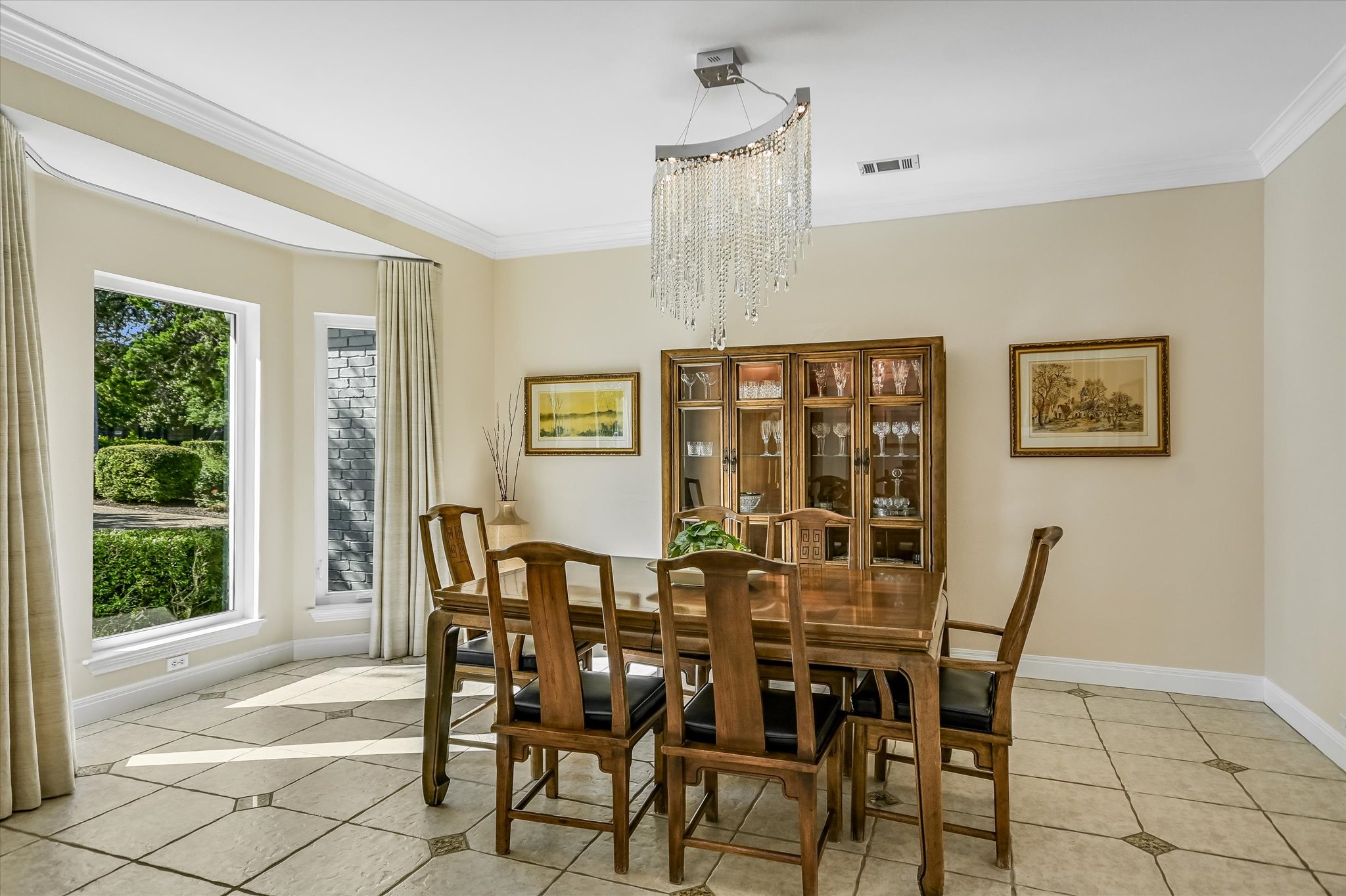 7901 Jester Boulevard Austin, TX 78730 - Photo 12 of 40 a view of a dining room with furniture and a window