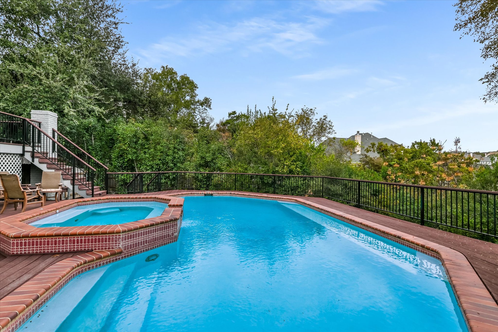7901 Jester Boulevard Austin, TX 78730 - Photo 30 of 40 a view of a swimming pool with a patio and a yard