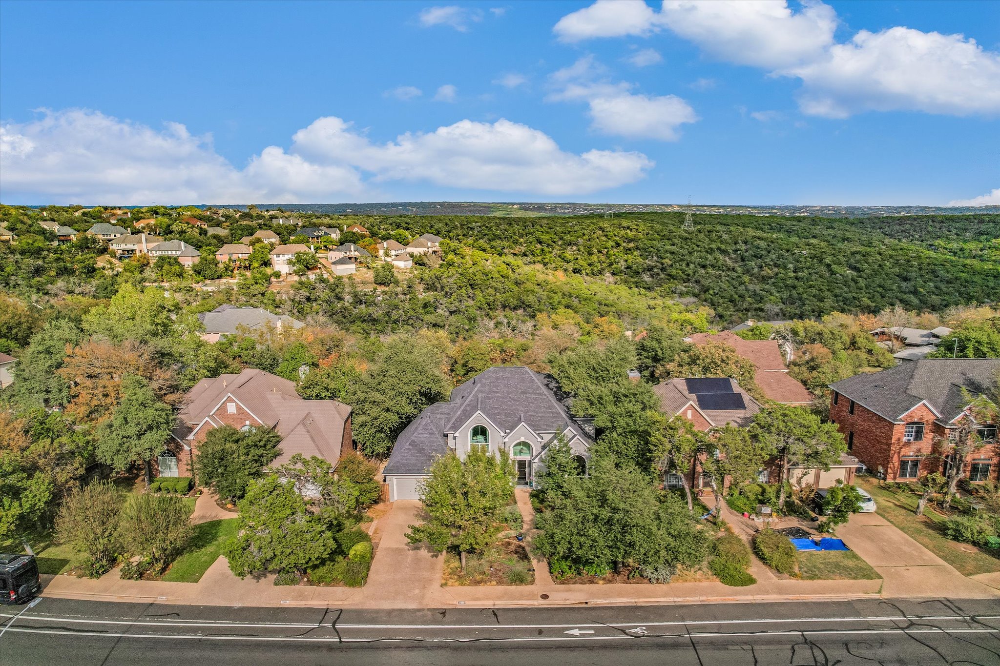 7901 Jester Boulevard Austin, TX 78730 - Photo 35 of 40 a view of a yard with front of house
