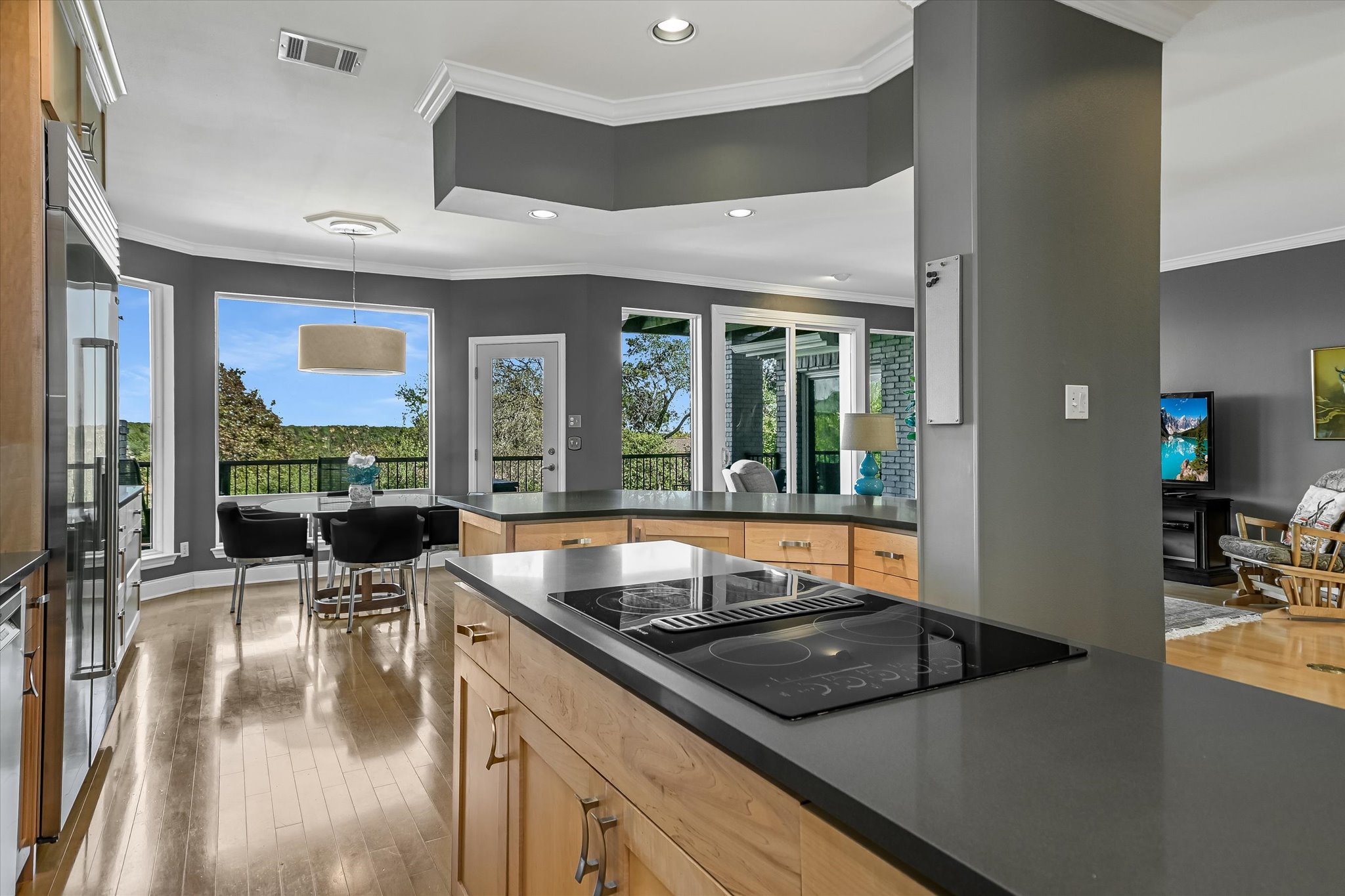 7901 Jester Boulevard Austin, TX 78730 - Photo 7 of 40 a kitchen with granite countertop a sink and a stove
