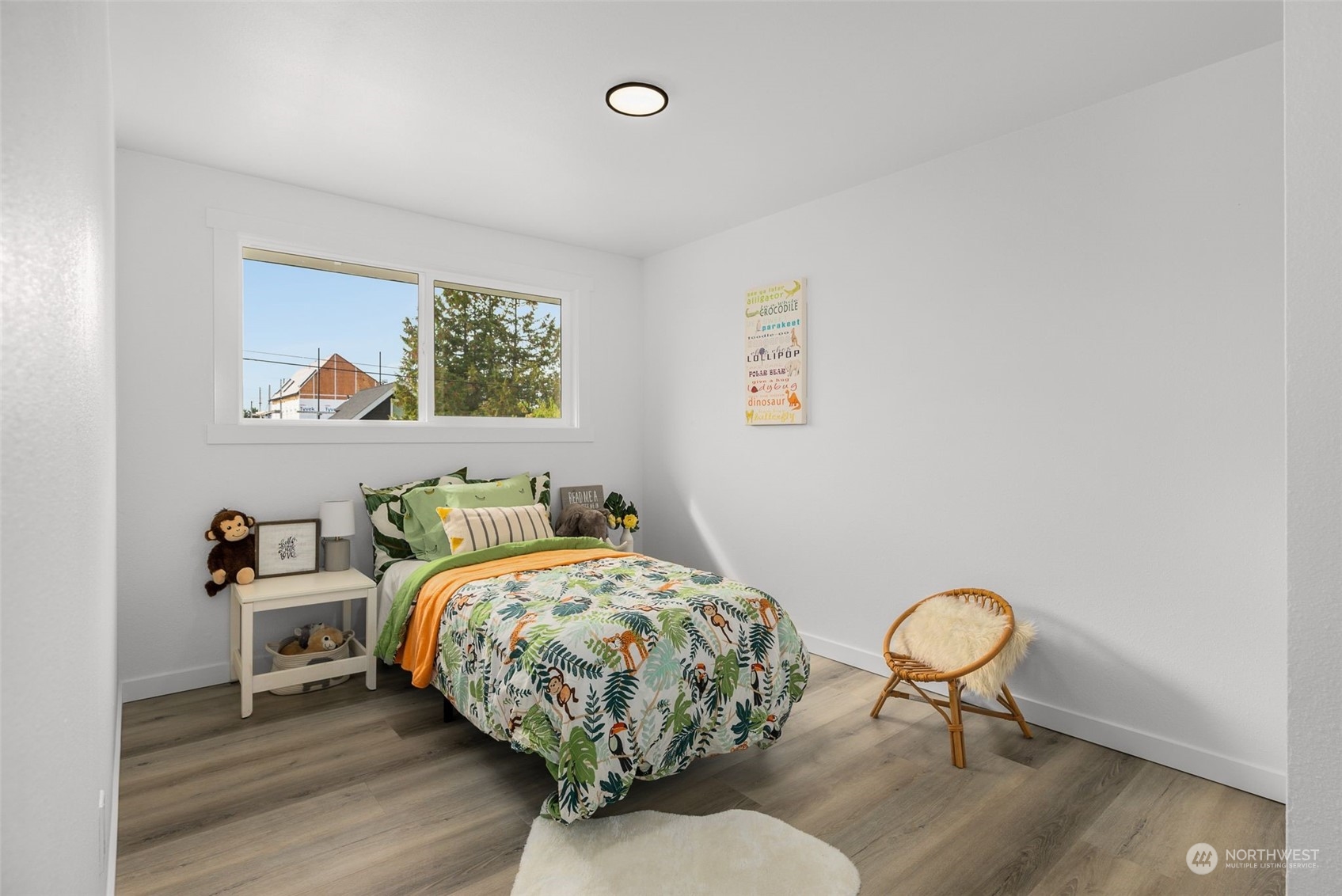 3932 South Morgan Street Seattle, WA 98118 - Photo 17 of 40 a bedroom with bed and a window