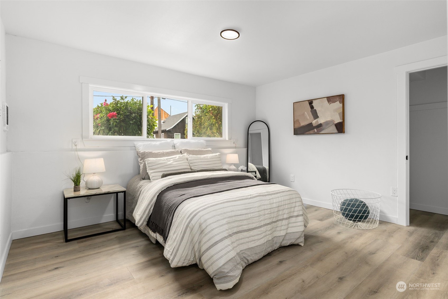 3932 South Morgan Street Seattle, WA 98118 - Photo 26 of 40 a bedroom with a bed and a window
