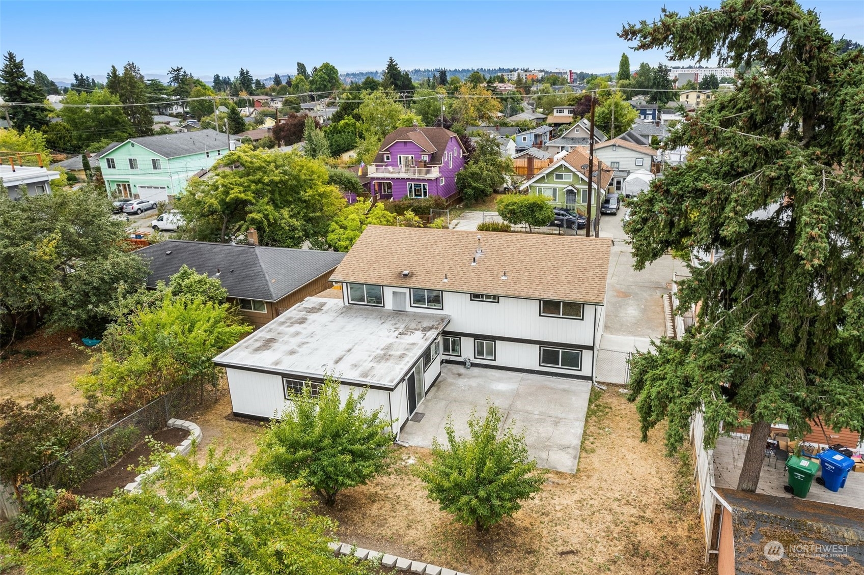 3932 South Morgan Street Seattle, WA 98118 - Photo 35 of 40 an aerial view of a house with a garden