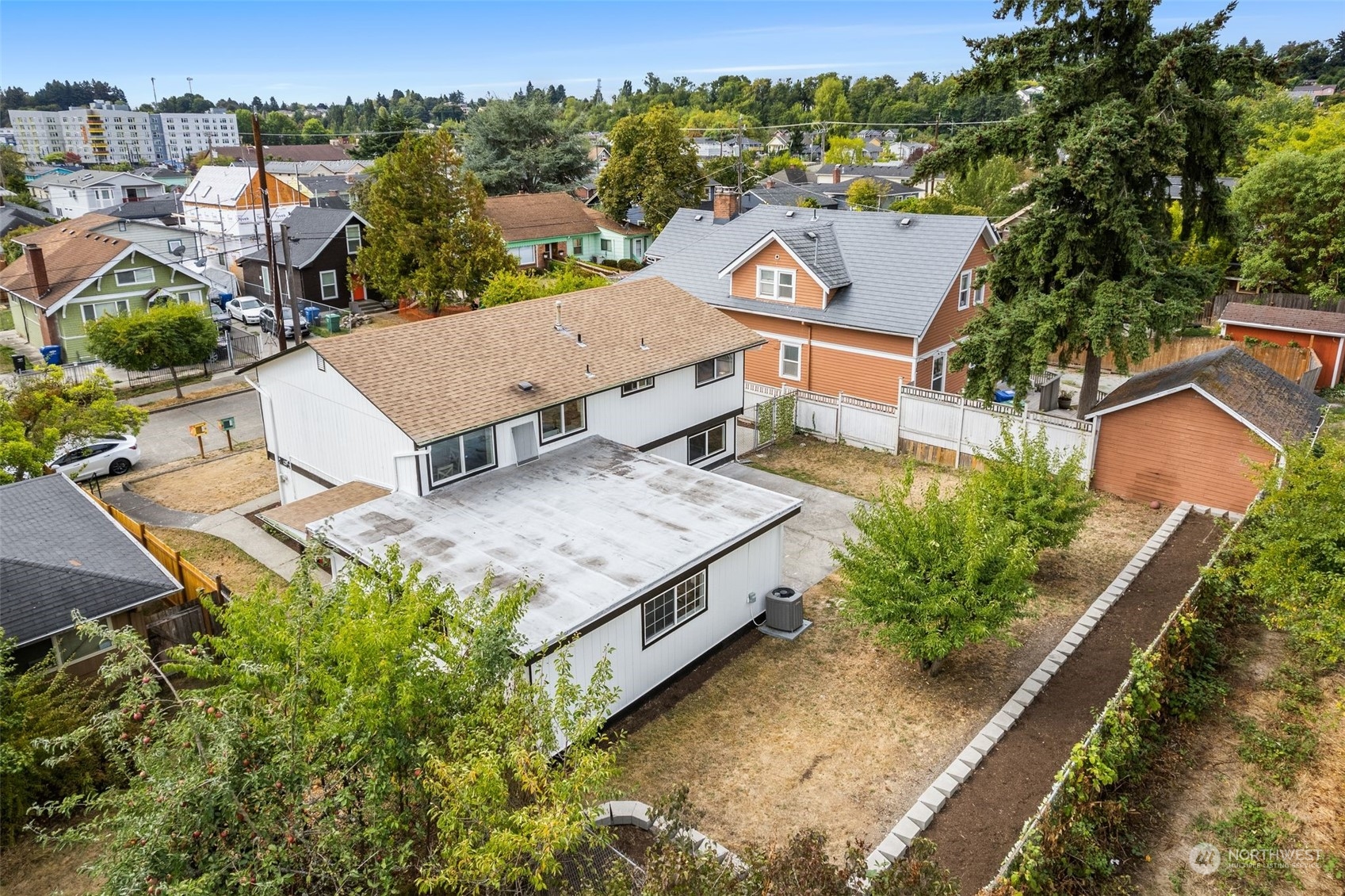 3932 South Morgan Street Seattle, WA 98118 - Photo 36 of 40 an aerial view of a house with a garden