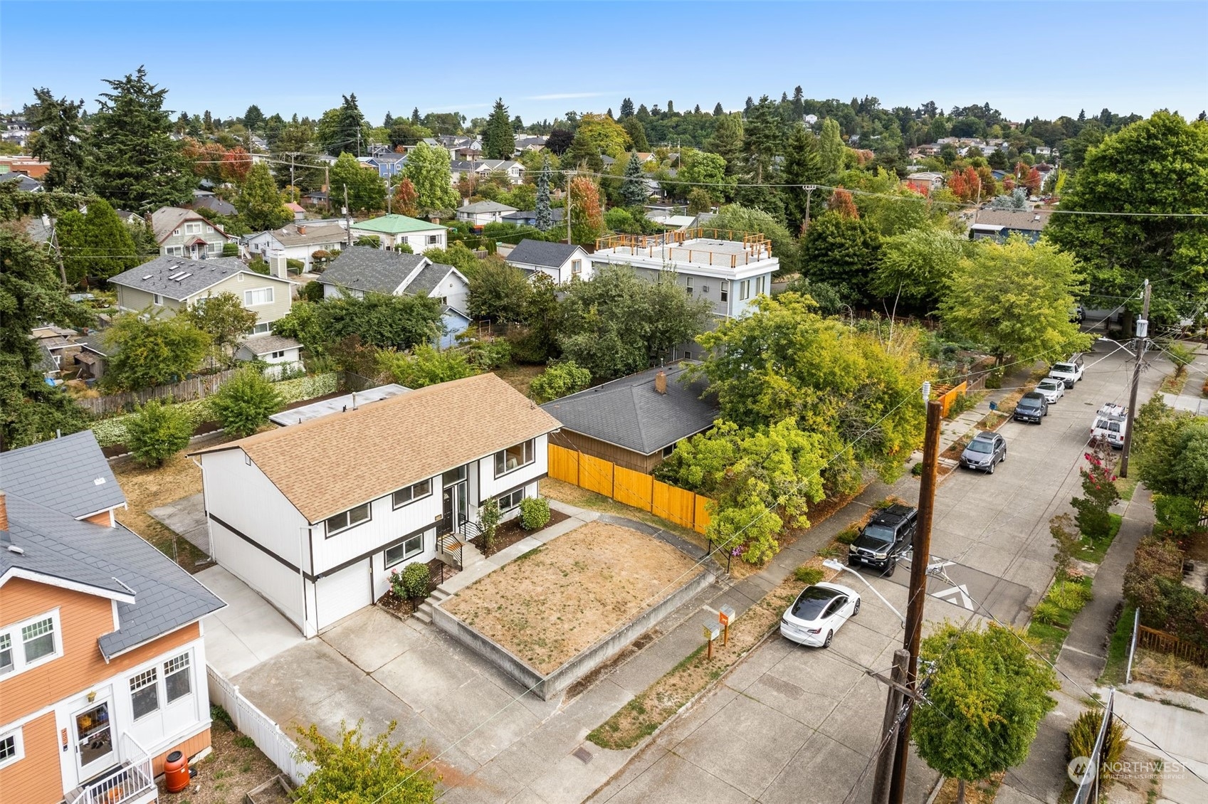 3932 South Morgan Street Seattle, WA 98118 - Photo 38 of 40 an aerial view of a house with a garden
