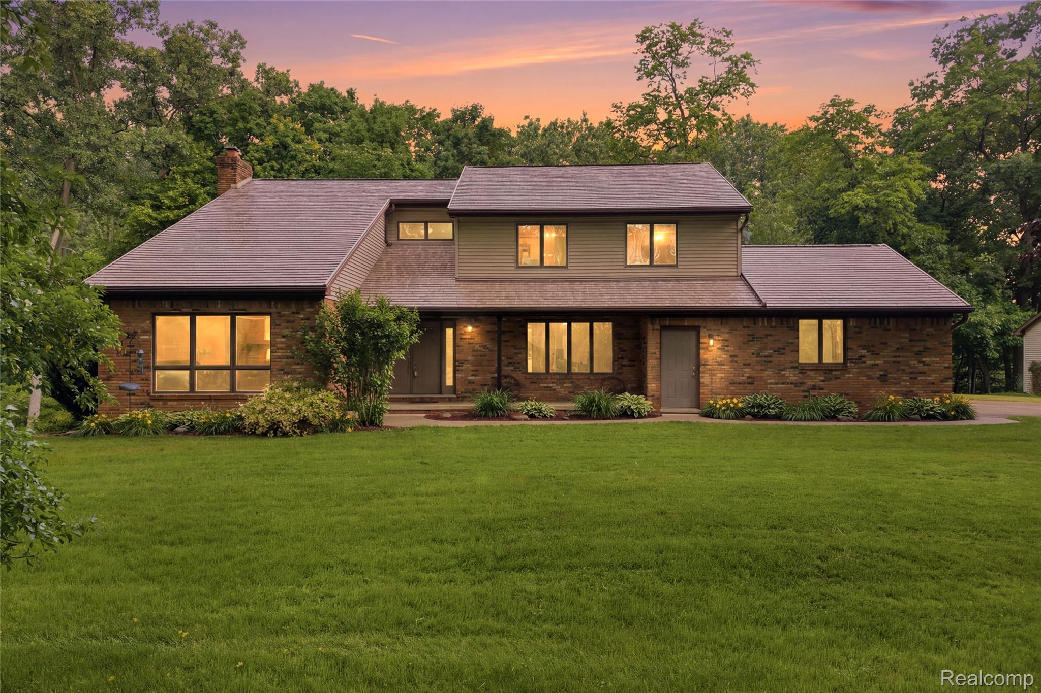 68345 Romeo Plank Road Ray, MI 48096 - Photo 1 of 52 Expansive front lawn complementing a brick and siding exterior