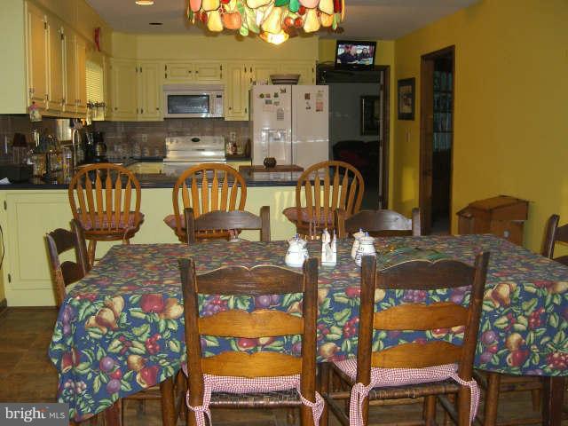 4302 Valley View Road Middletown, MD 21769 - Photo 8 of 22 Table space for six adjoins kitchen